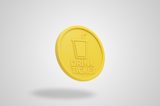 A photo of a yellow plastic token with embossing